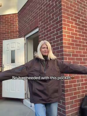 TikTok post by @adelefrances7 for PUFFIT UK Shop. Caption reads: @PUFFIT.UK.SHOP overhead rain coat with a huge....