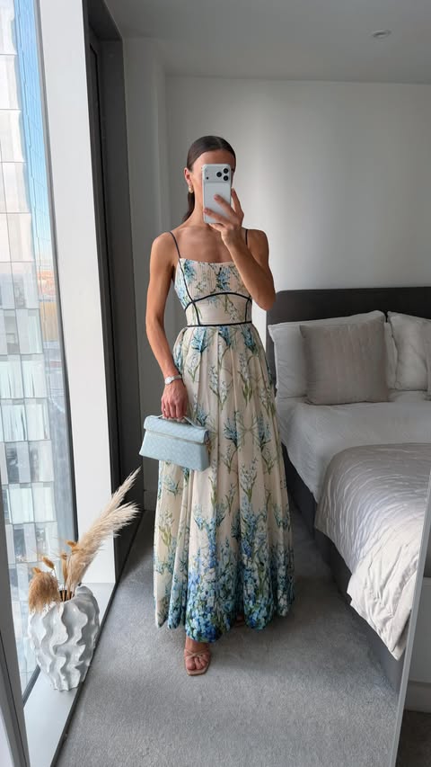 Instagram post by @whatemwore for Karen Millen. Caption reads: ad. when an outfit gives you confidence you know....