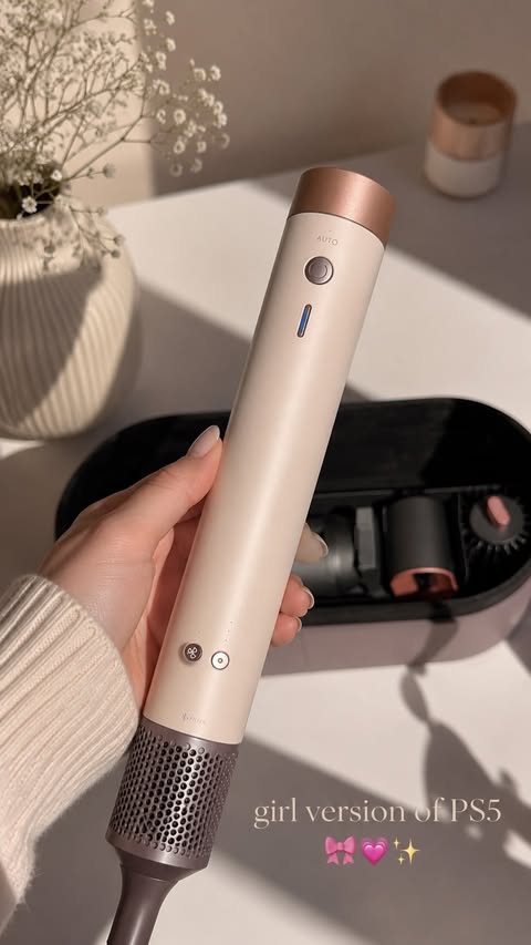 Instagram post by @mariam.n0zadze for Dyson Beauty. Caption reads: 🫧🥰 #dyson #air #trendy #lifestyle #hairstyles.