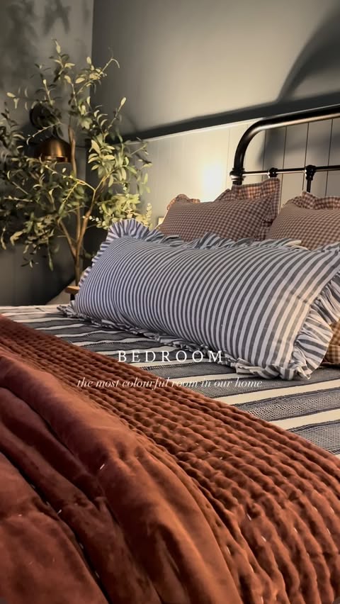 Instagram post by @thelistedcoachhouse for The Cotswold Company. Caption reads: [...] Black Bedspread and Bedside Table The....