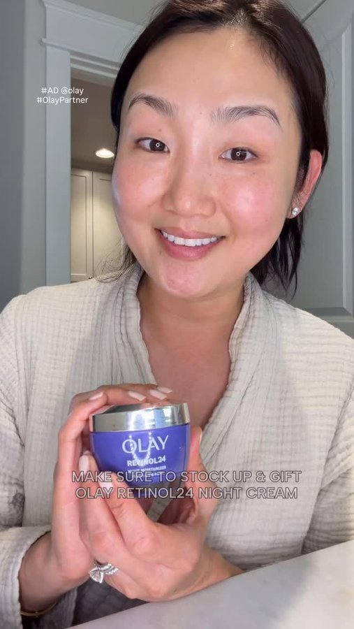 Instagram post by @tamsskyn for OLAY. Caption reads: #AD #OlayPartner Stock up for yourself and give....