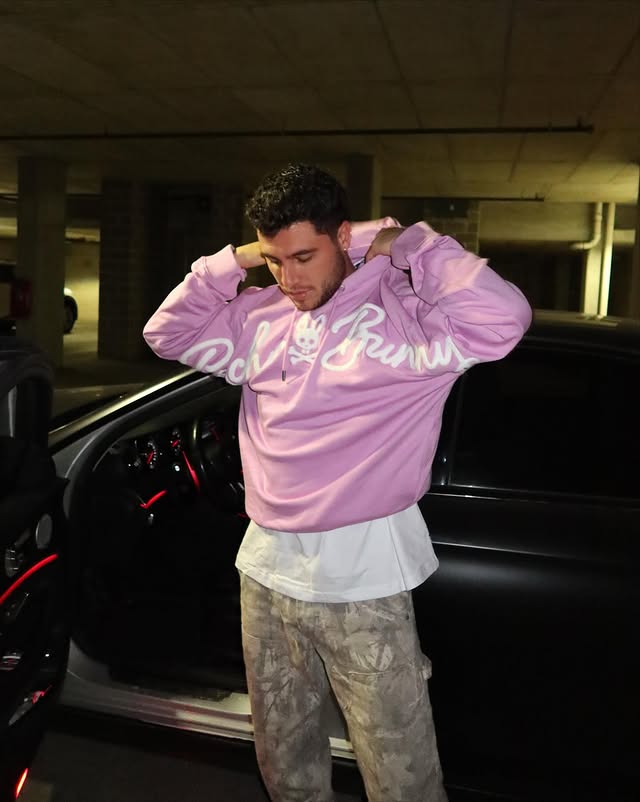 Instagram post by @mannythecolombian for Psycho Bunny. Caption reads: [...] shop the newest collection now #Psychobunny....