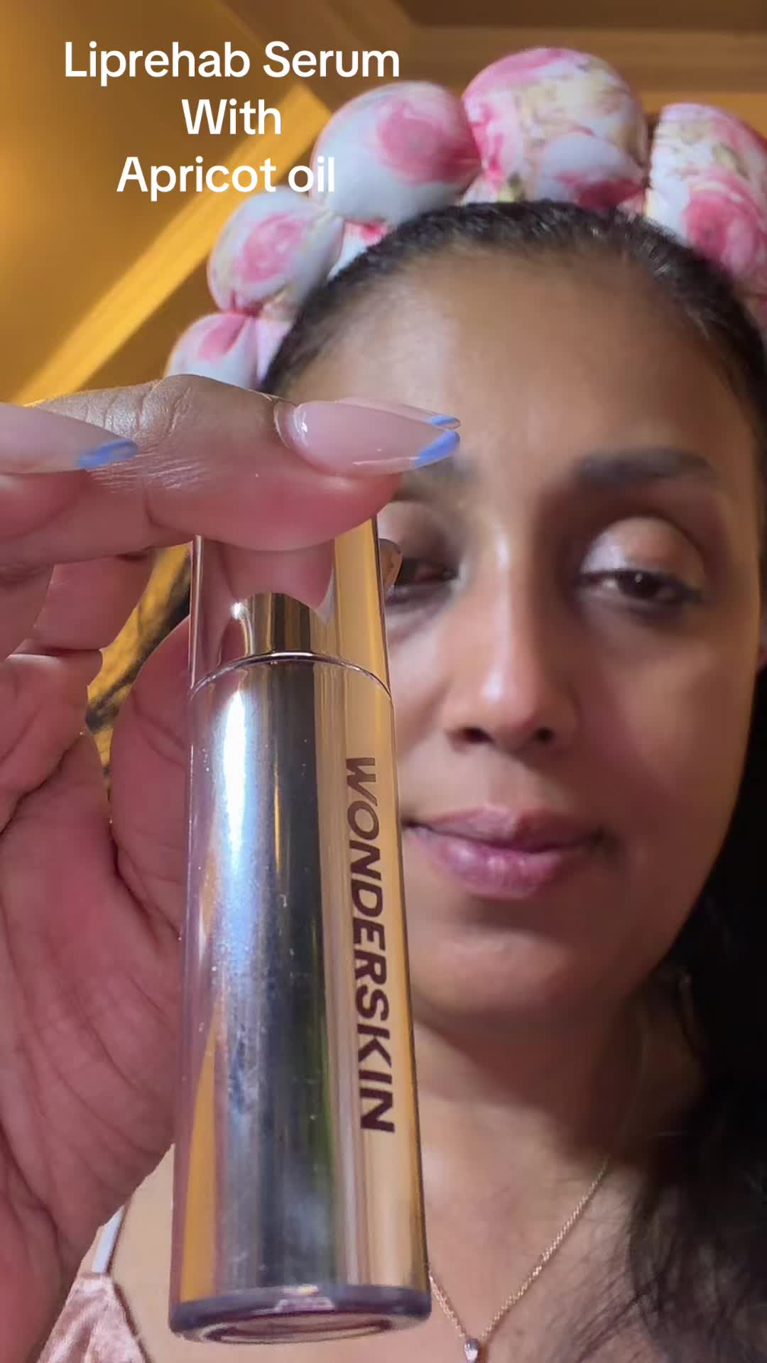 TikTok post by an influencer for Wonderskin Beauty. Caption reads: #liprehabserum #lipoil #drylips #skincareroutine....