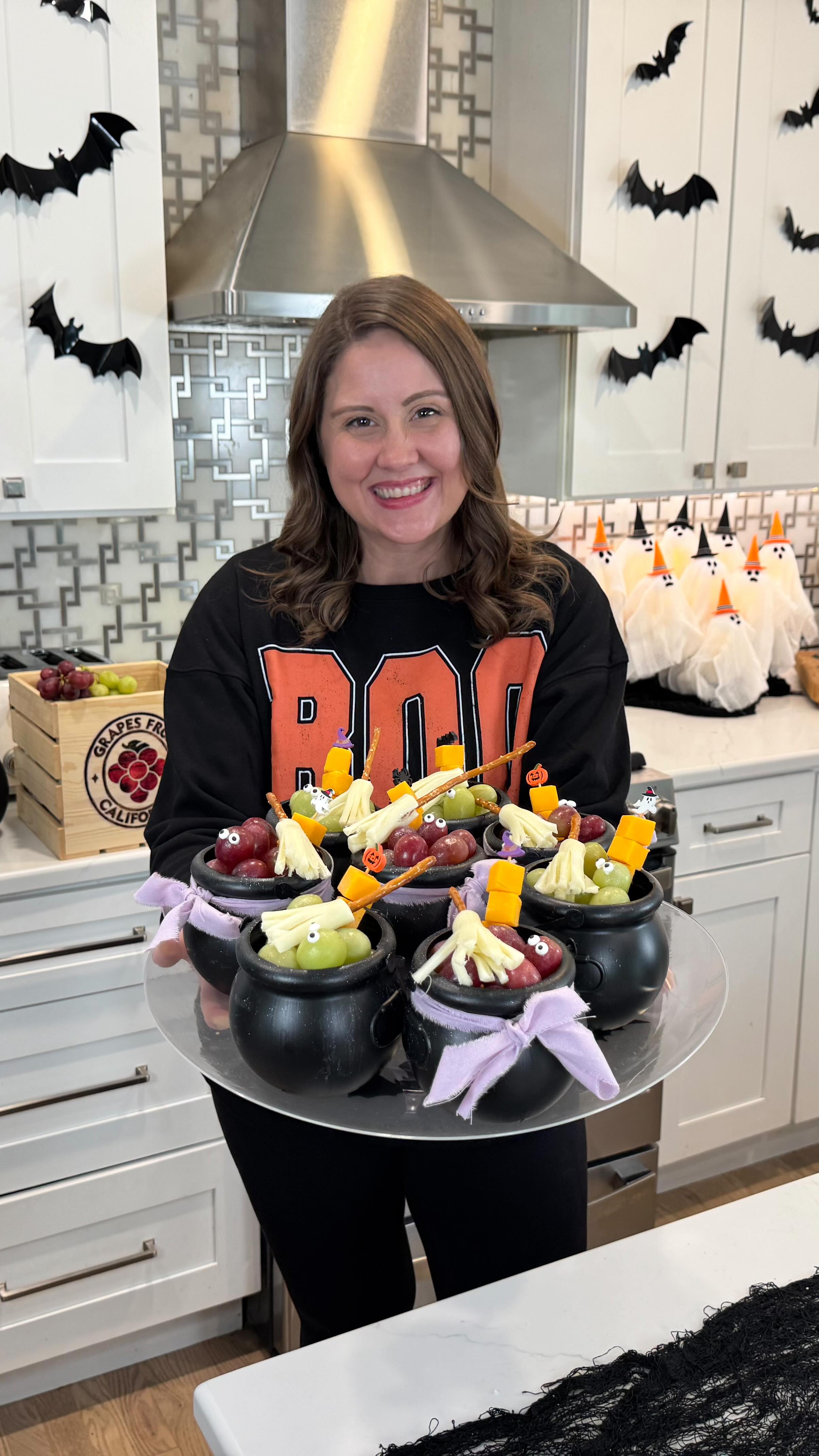 Instagram post by @youngwildmefamily for Grapes from California. Caption reads: 🧙‍♀️✨ Stirring up something Witch-tricious!🪄....