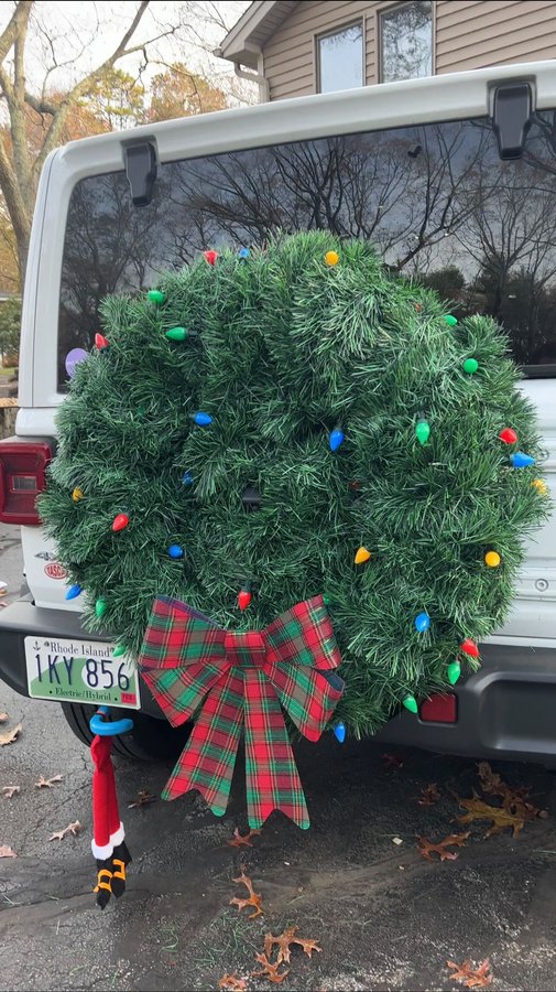 Instagram post by @jesscostantino for Jeep. Caption reads: bringing back the tire wreath… one of my most....