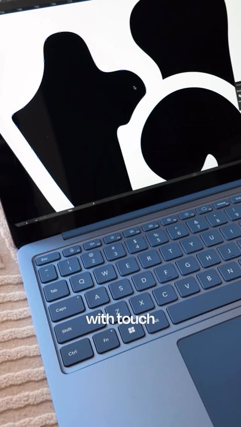 Instagram post by @helloqori for Microsoft Surface. Caption reads: #SurfacePartner My tech load is much lighter this....