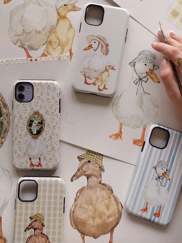 Instagram post by @ellie.mae.designs for The Dairy. Caption reads: [...] duck phonecase collection with @thedairy 🦆....
