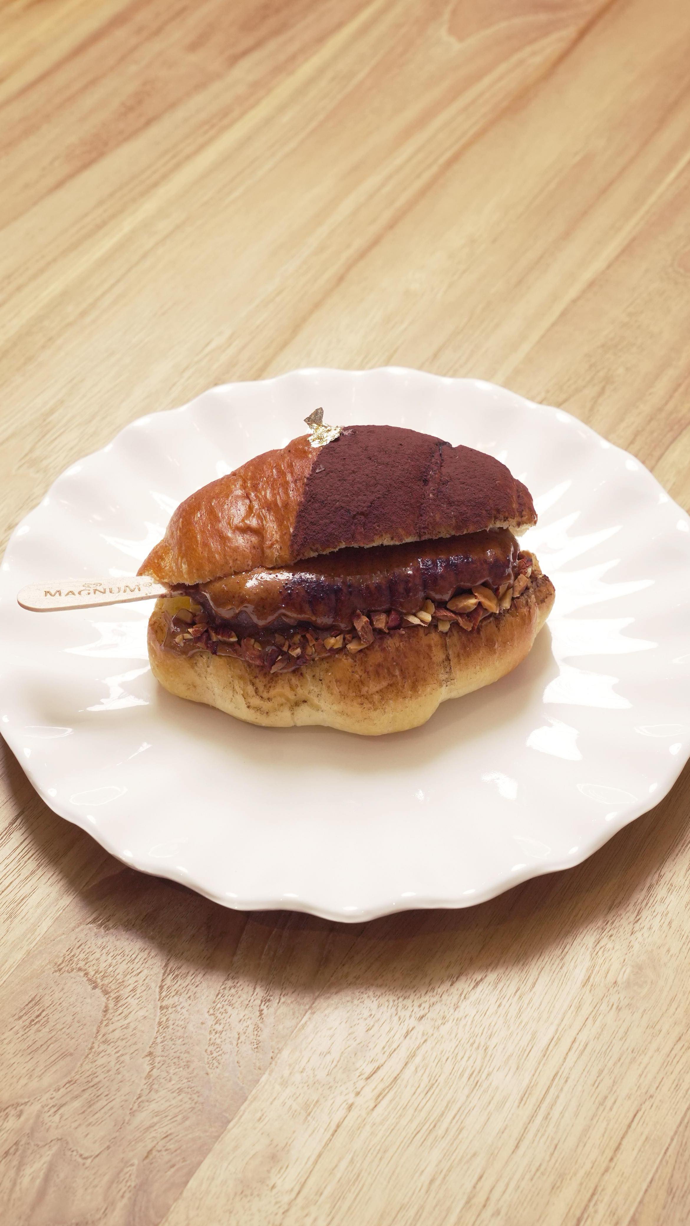 Instagram post by @mongsim_ours for Magnum Ice Cream. Caption reads: Introducing Almond Shock 👀 a sweet and savory....