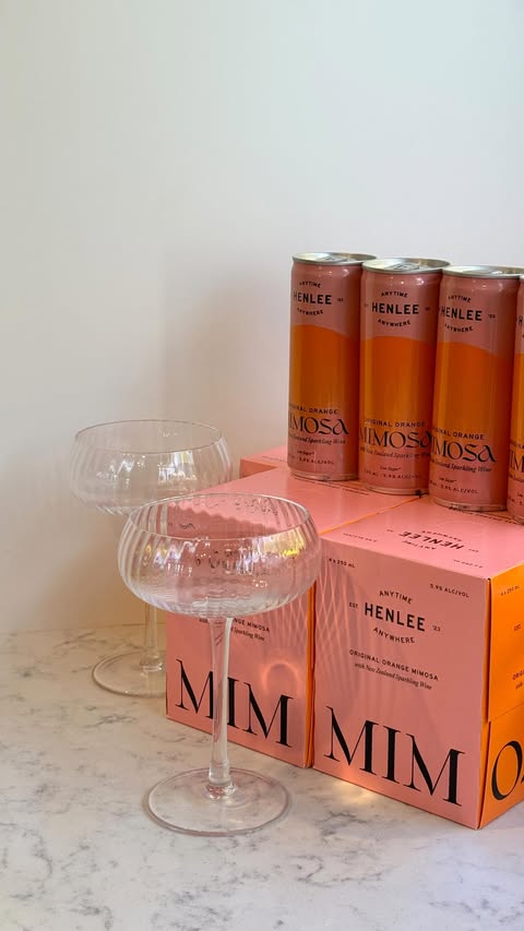 Instagram post by @kateehazeldine for Henlee. Caption reads: Remember to shake your @drink_henlee mimosas to....