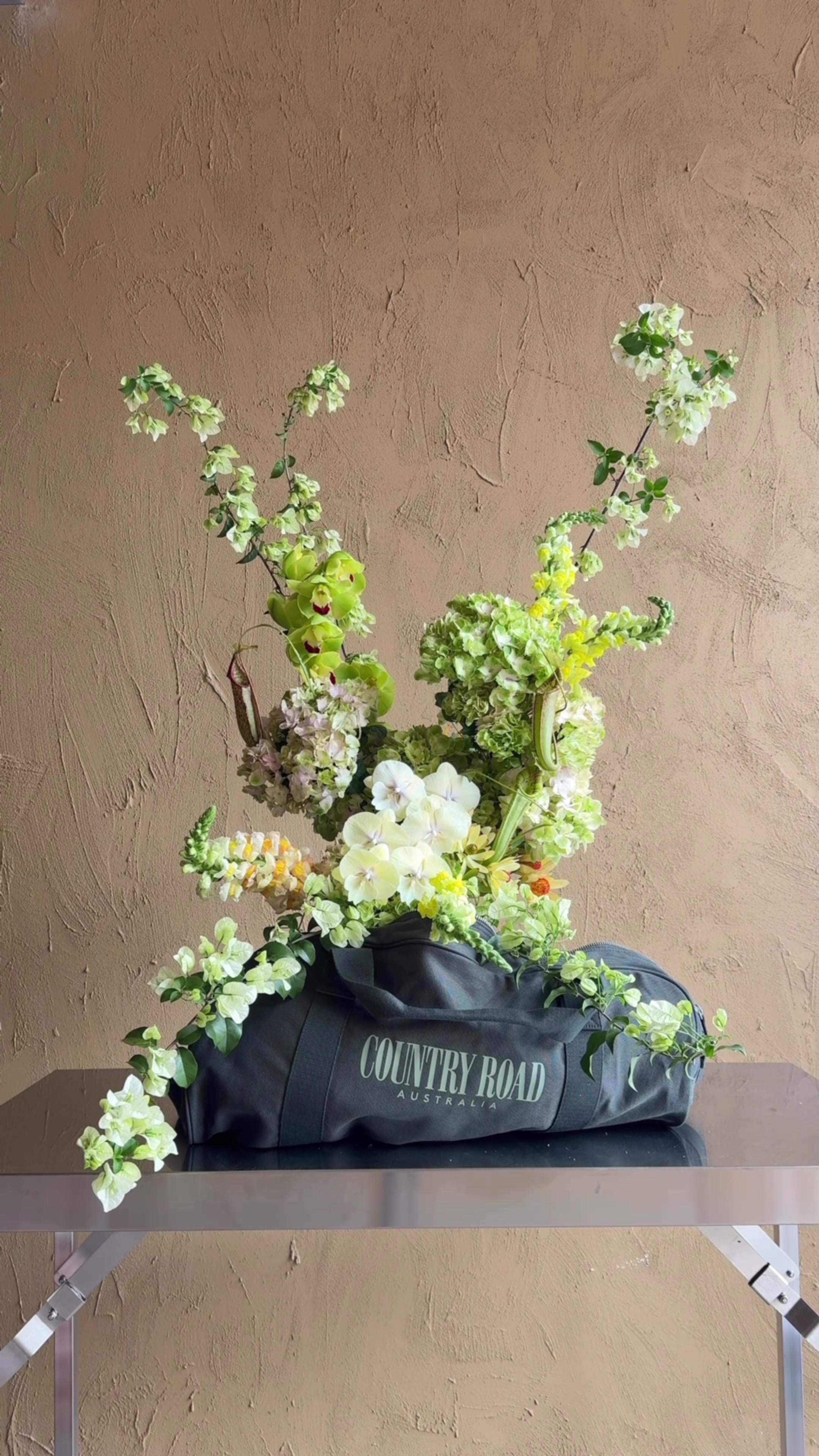 TikTok post by @september__studio for Country Road. Caption reads: What goes with fresh blooms? My Country Road....