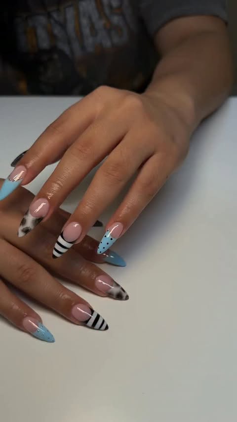 Instagram post by @nailslpc.xo for Modelones. Caption reads: [...] 🩵 Created this set using the @modelones 28....