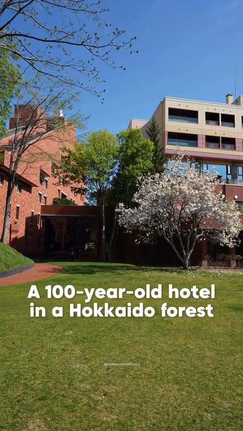 Instagram post by @hokkaidowithmina for Klook Kreator Program. Caption reads: This hotel in Hokkaido was built in the middle of....