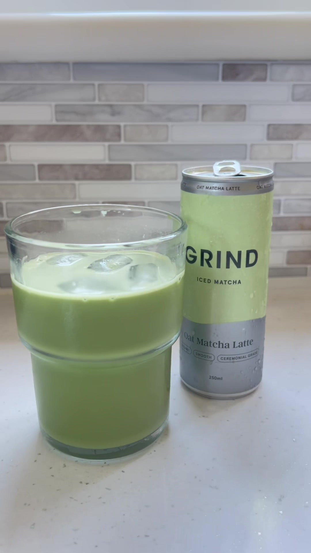 TikTok post by @mumsbudgetplan_ for Grind. Caption reads: Ad | @socialtiphq @Grind Iced, smooth and so....