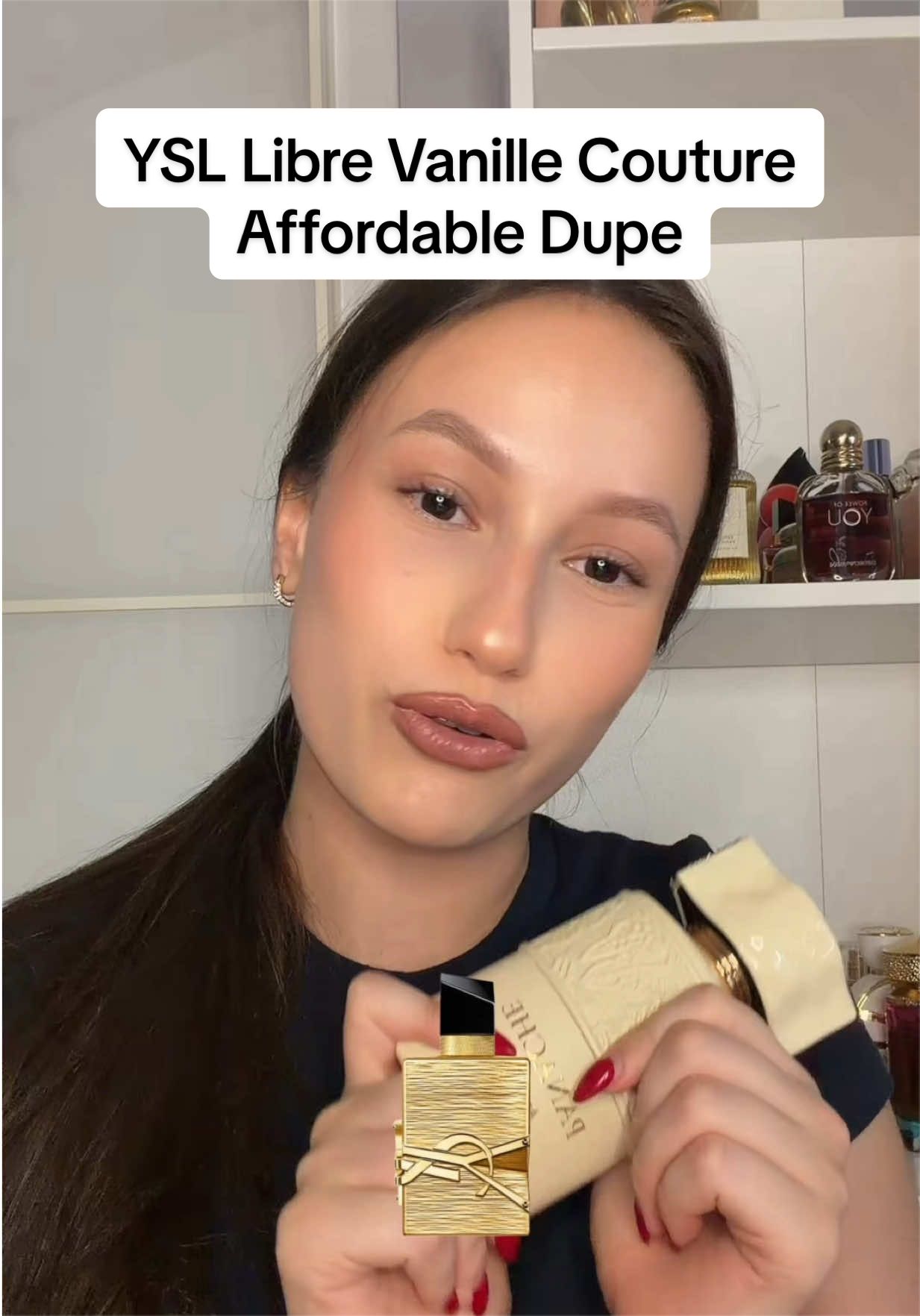 TikTok post by an influencer for Khadlaj Perfumes. Caption reads: @Khadlaj Perfumes Never fails to blow my [...].