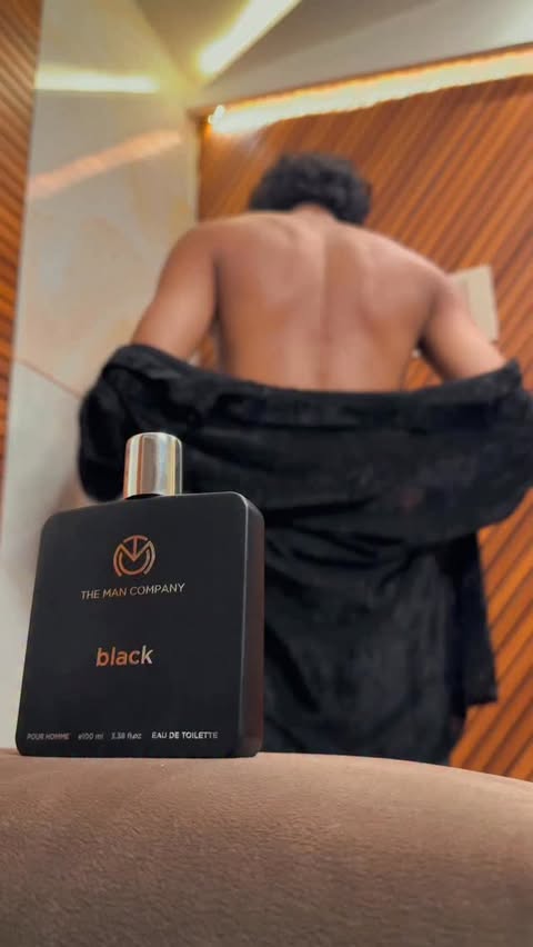 Instagram post by @whofuzailll for The Man Company. Caption reads: Upgrade your fragrance game with BLACK by The Man....