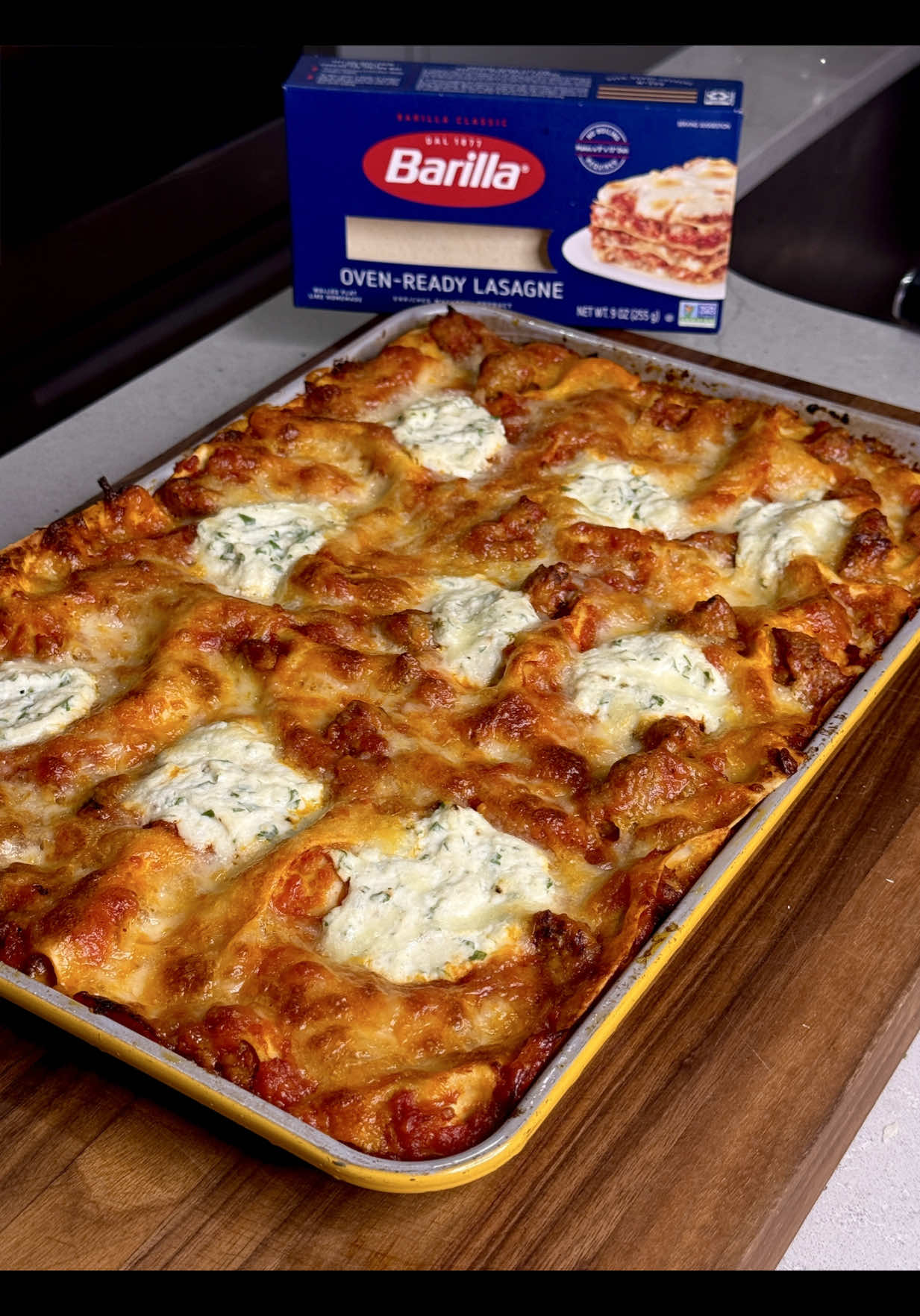 TikTok post by @flavorsbyalessandra for Barilla. Caption reads: #ad Ultimate Sheet Pan Lasagna…all the flavor and....