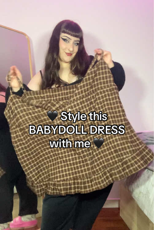 TikTok post by @martaxfits for Forest Ink. Caption reads: Style this @Forest Ink babydoll dress with me 🖤....