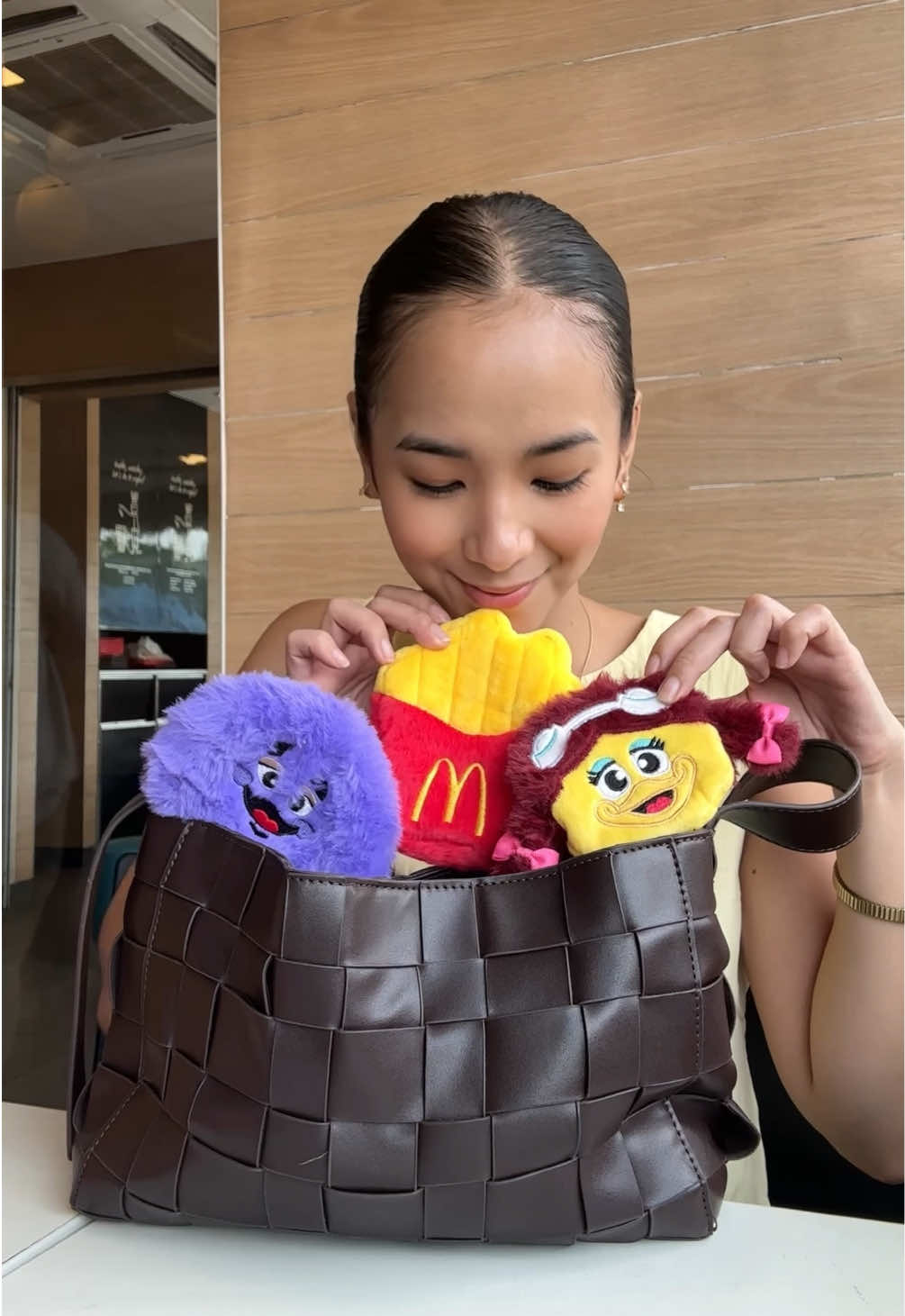 TikTok post by @jeanettetaneca for McDonald's Philippines. Caption reads: getting extra with my outfits = getting extra....