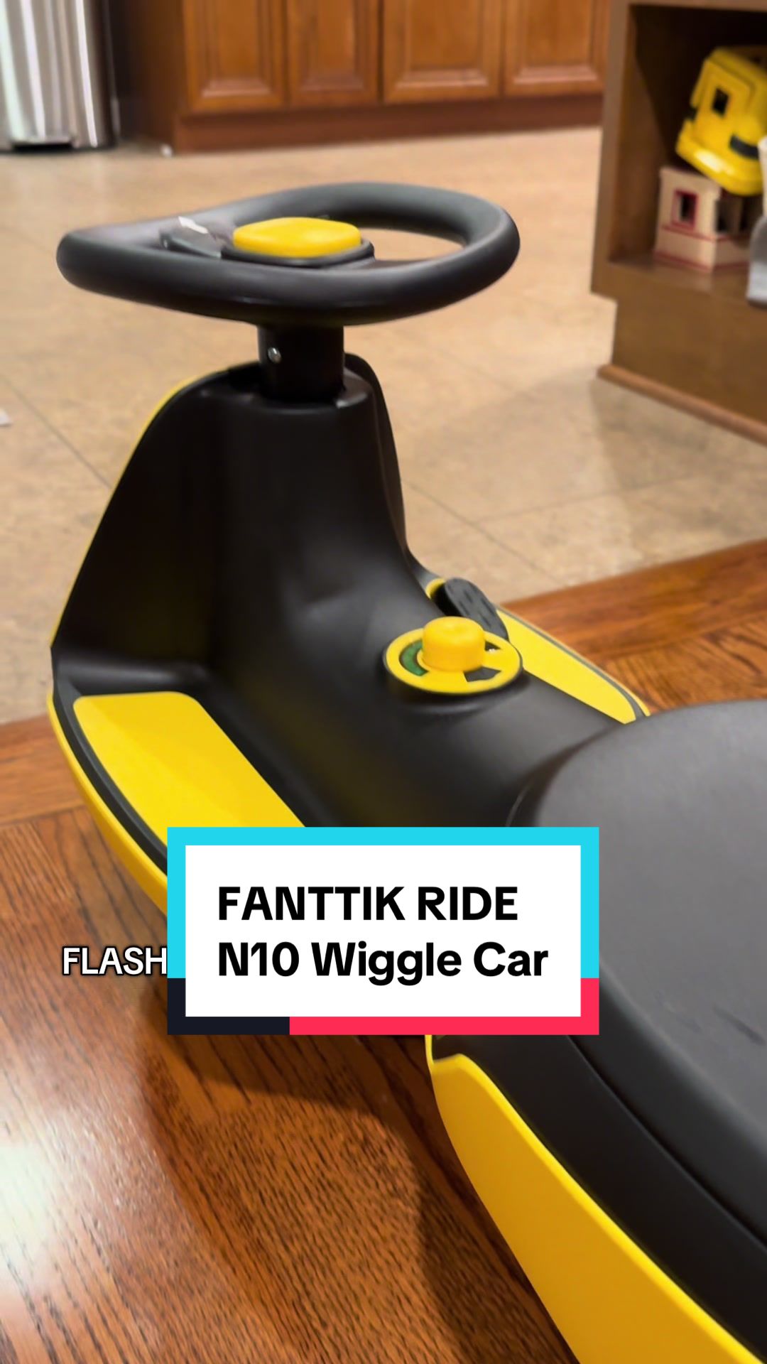 TikTok post by @makebuilddad for Fanttik. Caption reads: IT HAS A MOP NOW! The @FanttikRide N10 Wiggle car....