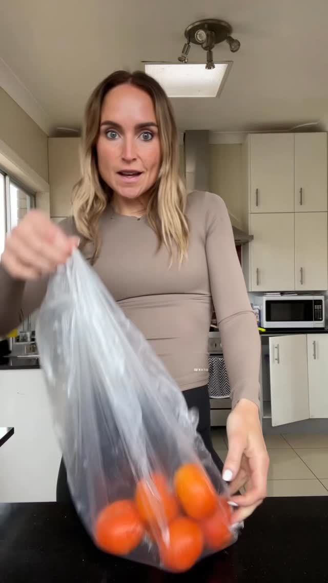 Instagram post by @aims.lc for Woolworths. Caption reads: Aussie grown Delite mandarin hack unlocked.....