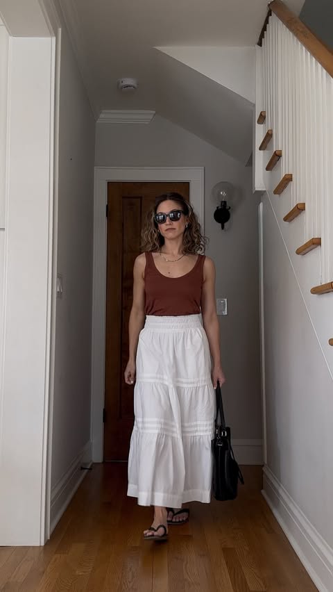 Instagram post by @ashrohr for Quince. Caption reads: White Maxi Skirt - three ways! @onequince This....