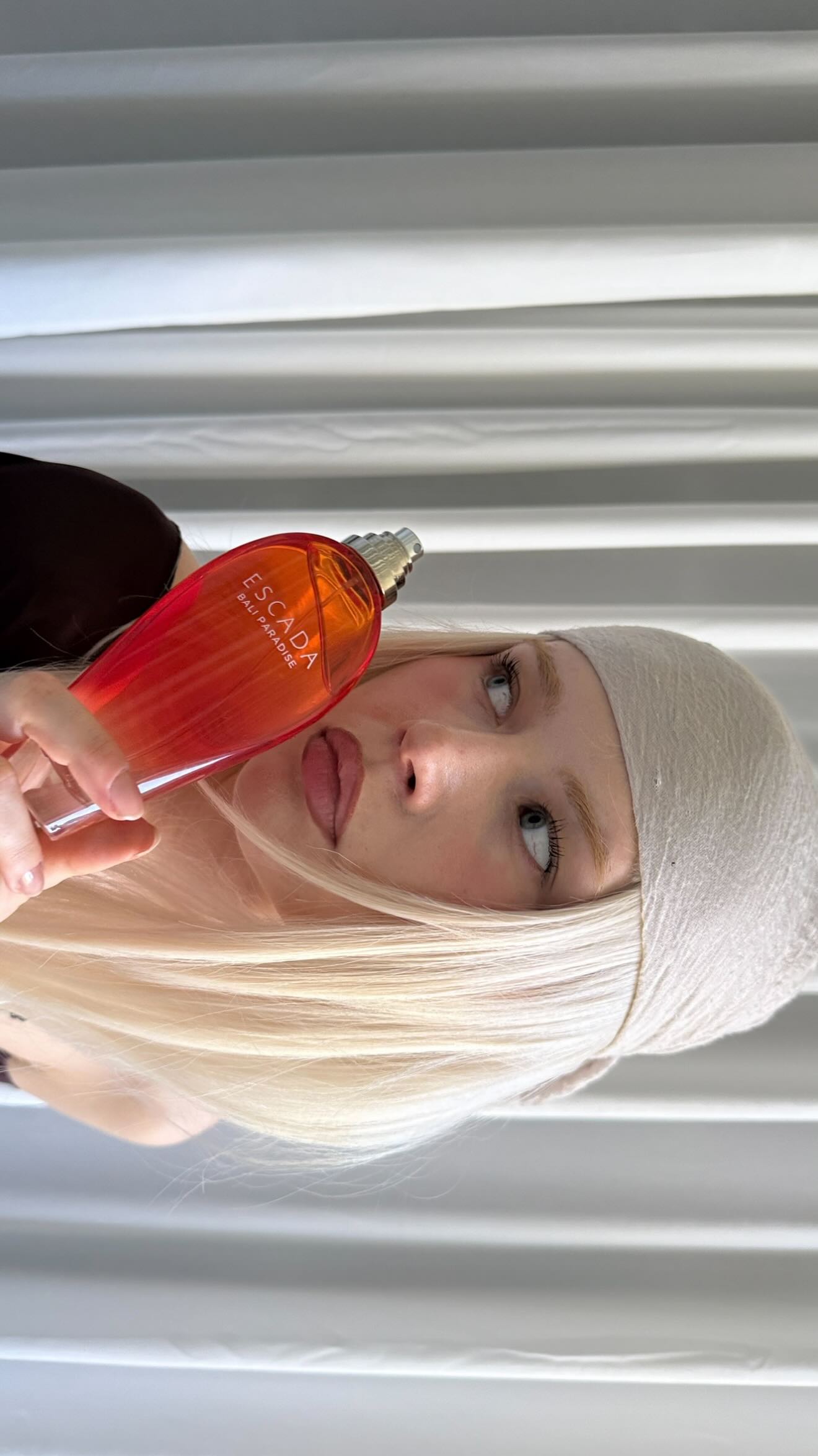 Instagram post by @girlcalledluca for Escada Fragrances. Caption reads: A scent that matches every mood @escadafragrances....