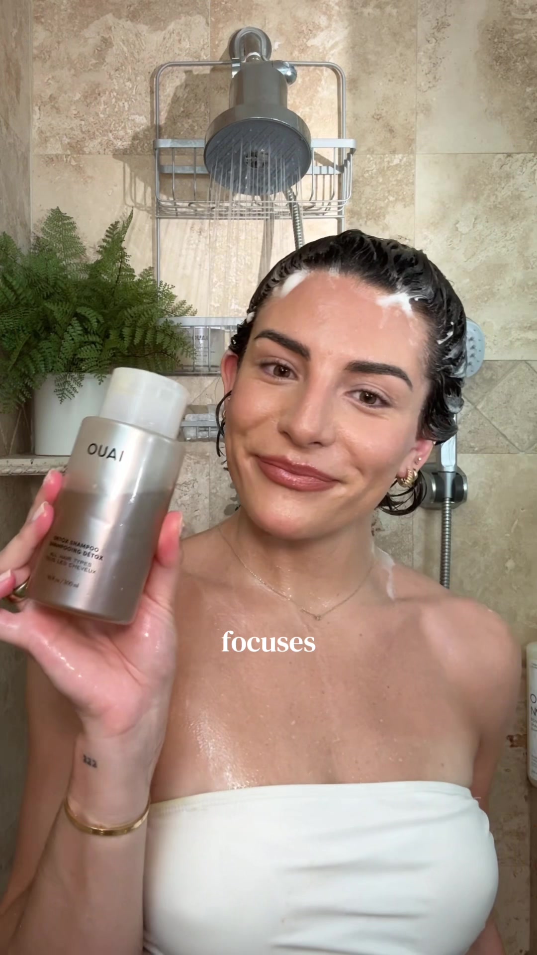 TikTok post by @itsmarinaann for OUAI. Caption reads: [...] 🚿🤍🧴 Detox Shampoo from @THE OUAI will....