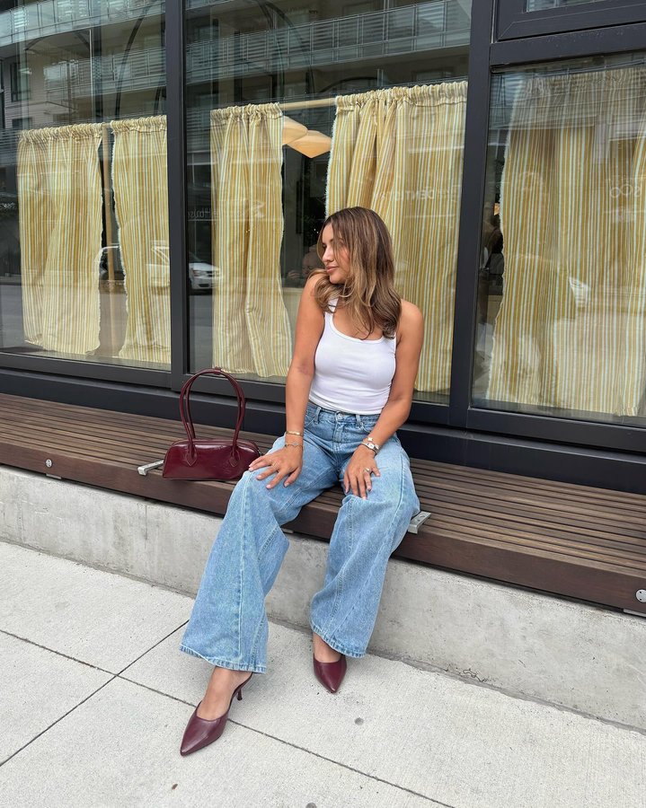 Instagram post by @davneetdhillon for callitspring. Caption reads: Flirting with Fall in @callitspring 🍂 Wearing the....