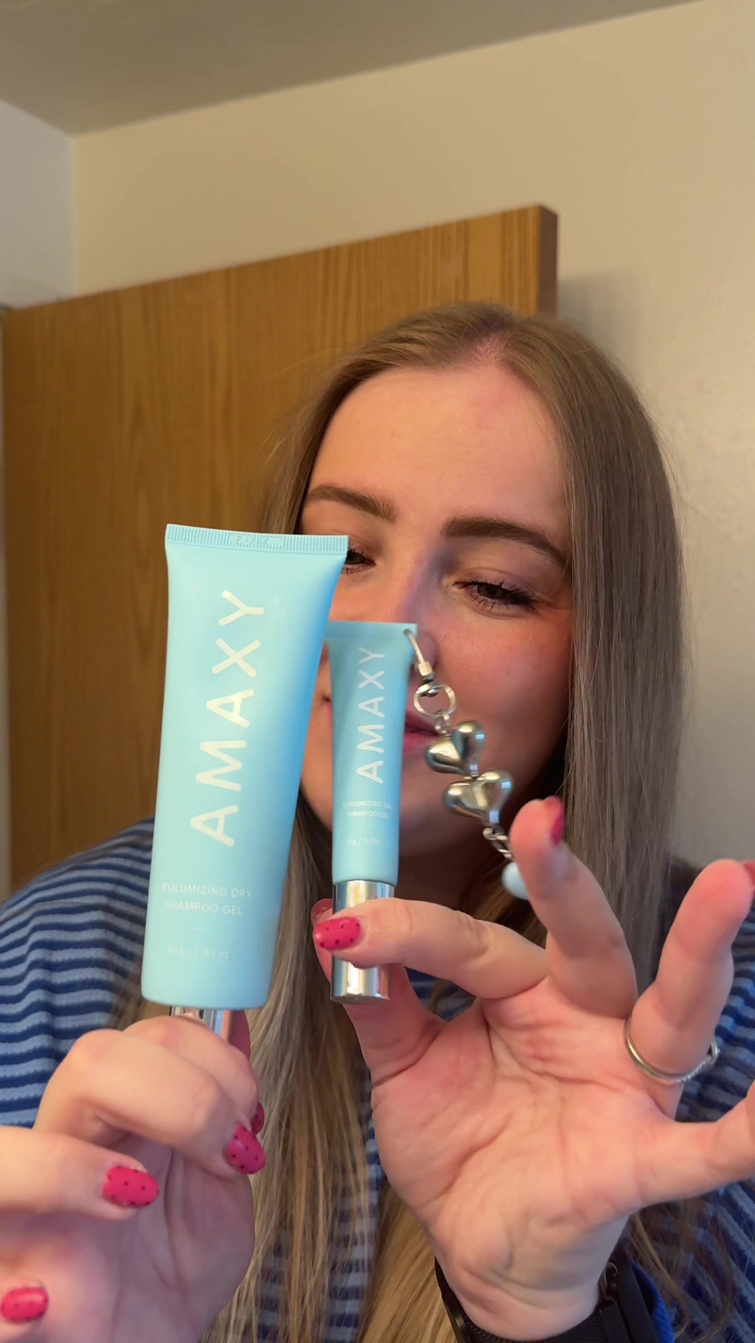 TikTok post by @taylordixonallart for AMAXY Beauty. Caption reads: Did you know you can refill your mini dry shampoo....