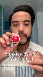 Instagram post by @mrbatlle for Buxom Cosmetics. Caption reads: Feeling sunlit and chic with my @merit x....