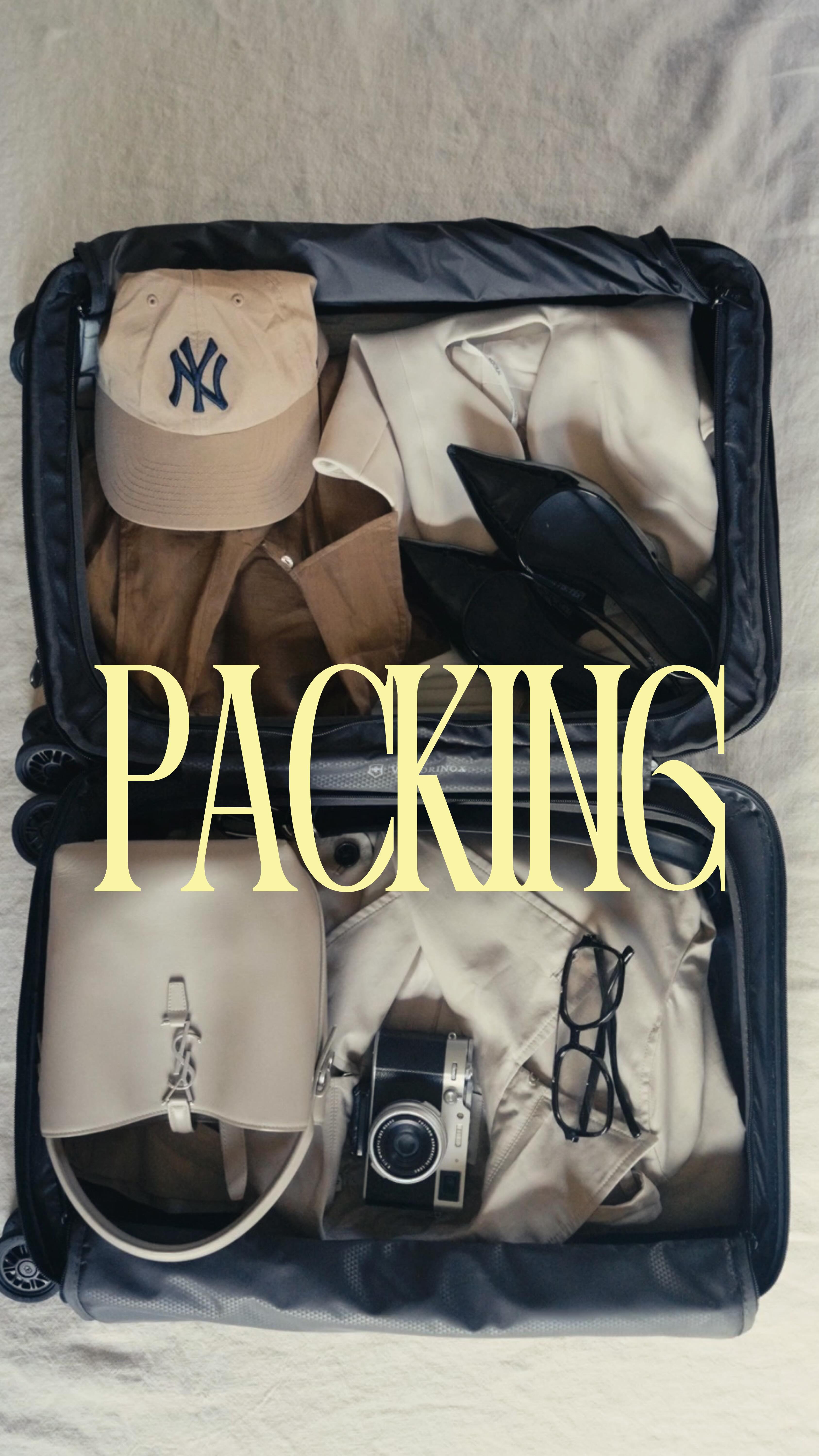 Instagram post by @twooutsiders for Victorinox. Caption reads: This carry-on fits your entire fall wardrobe —....