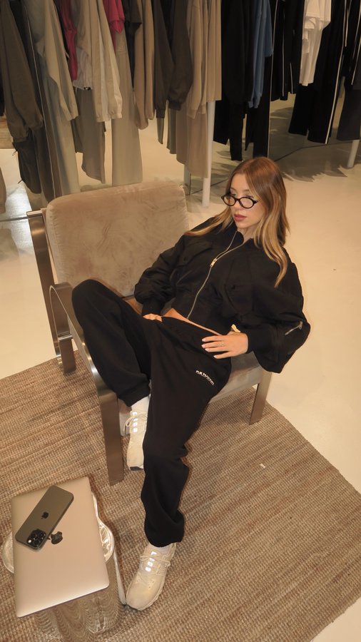 Instagram post by @georgierafferty for P.E Nation. Caption reads: @p.e.nation mid season sale is now live with....