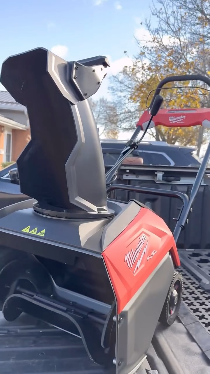 Instagram post by @milwaukee_tool_addict for Milwaukee Tool. Caption reads: Getting the @milwaukeetool Snow Blower unboxed and....