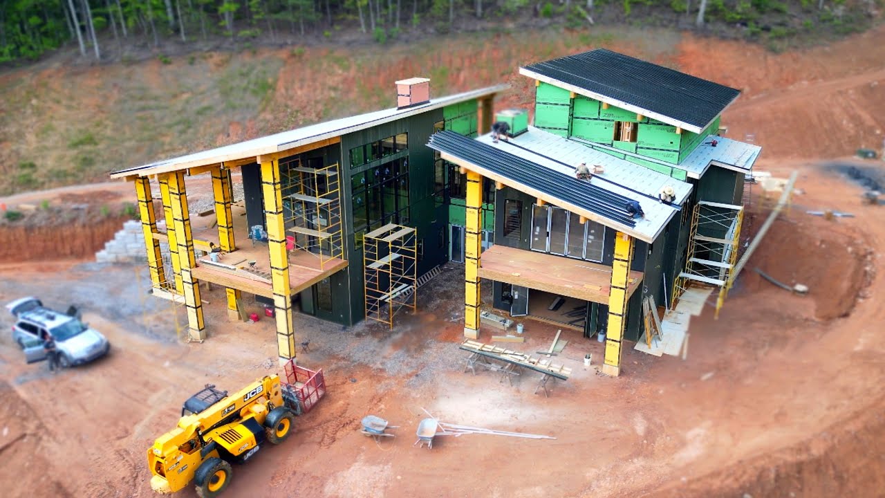 YouTube post by @PerkinsBuilderBrothers for Drink LMNT. Caption reads: Construction of a MEGA sized Modern Home P95.