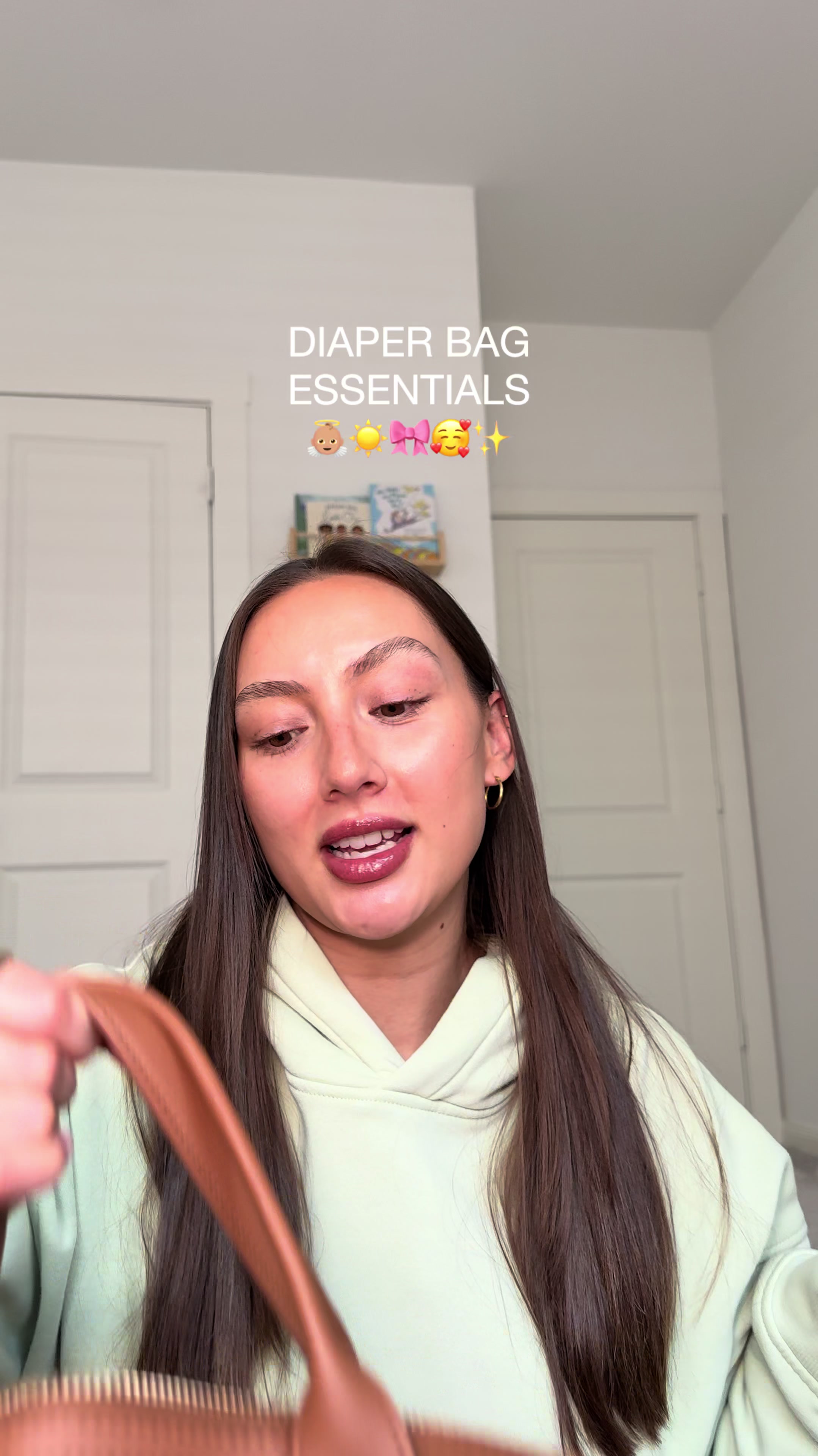 TikTok post by @danielleajeto for Freestyle. Caption reads: [...] #diaperbagessentials #Freestyle....