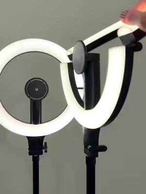 TikTok post by @create.amber.marie for KraftGeek. Caption reads: Kraftgeek making me want 20 of these ring lights....