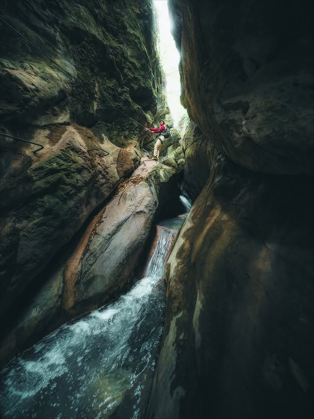 Instagram post by @giuliogroebert for Visit Trentino. Caption reads: [...] climb with breathtaking views in....