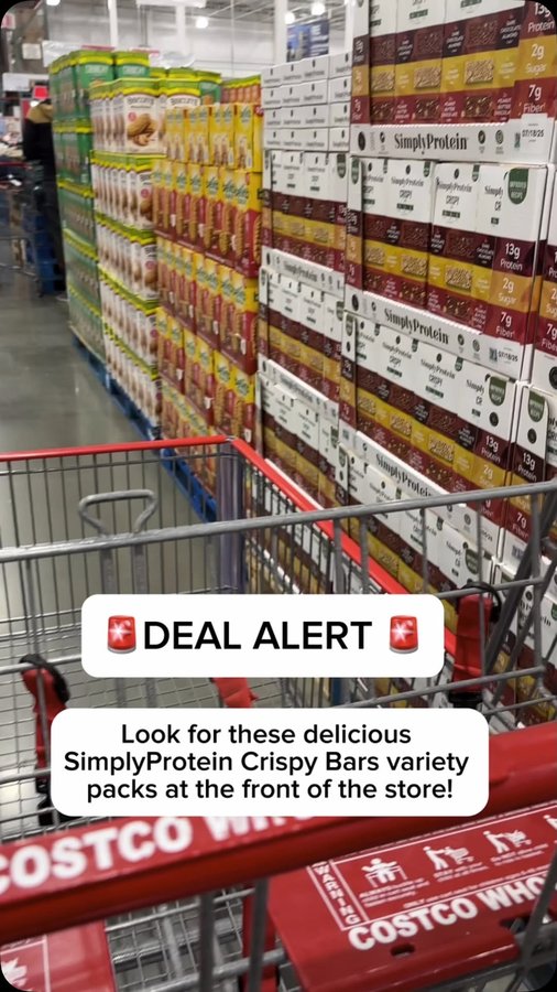 Instagram post by @costcodeals for SimplyProtein. Caption reads: 🚨DEAL ALERT 🚨

Look for these delicious, light....