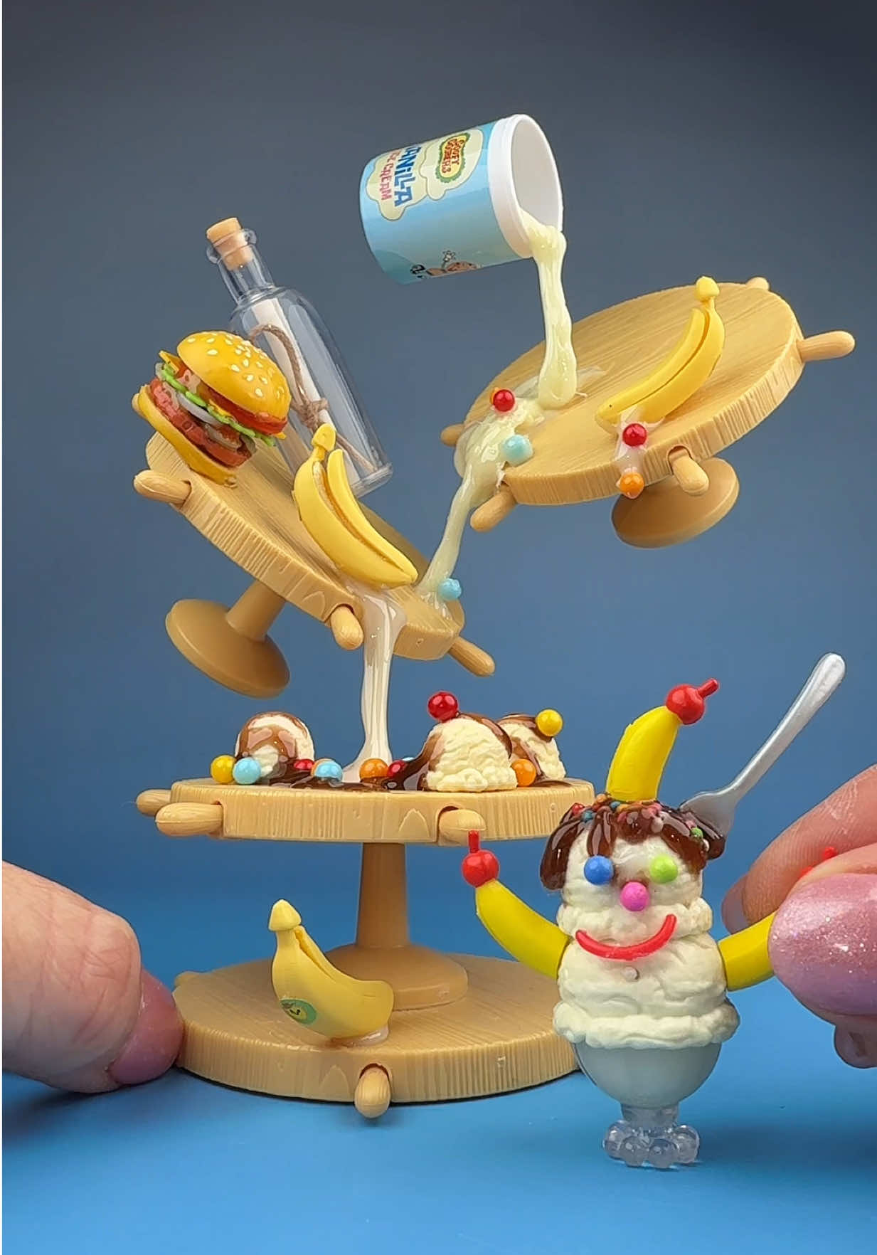 TikTok post by @miniverse_make_it_mini for SpongeBob SquarePants. Caption reads: @Miniverse x @SpongeBob Goofy Goobers 🍨💛🍒....