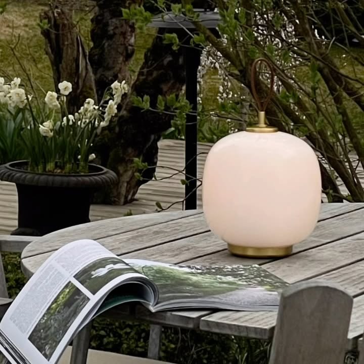 Instagram post by @stylizimoblog for Louis Poulsen. Caption reads: Ad// The VL 45 Radiohus Portable Lamp by....