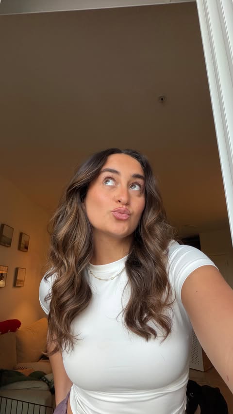 Instagram post by @morgan.elizabith for Revlon Hair Tools. Caption reads: Busy week = Blowing out my hair to make life....