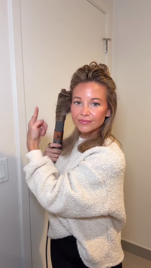 Instagram post by @kelliebullock for Aveda. Caption reads: Obsessed with @aveda NEW Abundant Blowout Spray....