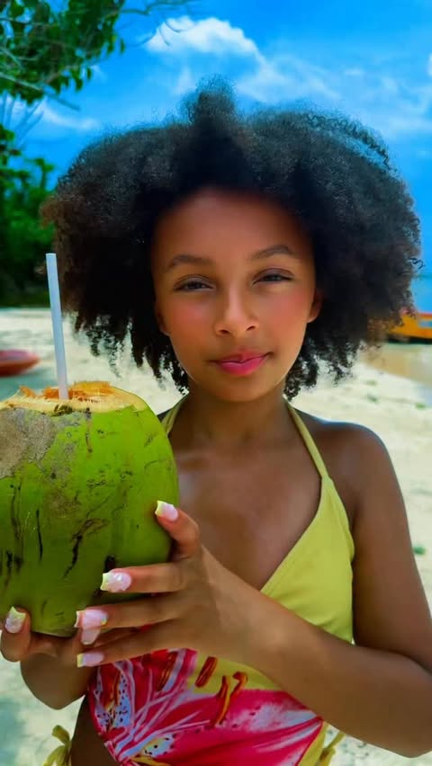 Instagram post by @aaronandamyb for TUI. Caption reads: [...] are you? UK? Oh… my condolences 🇯🇲😂....
