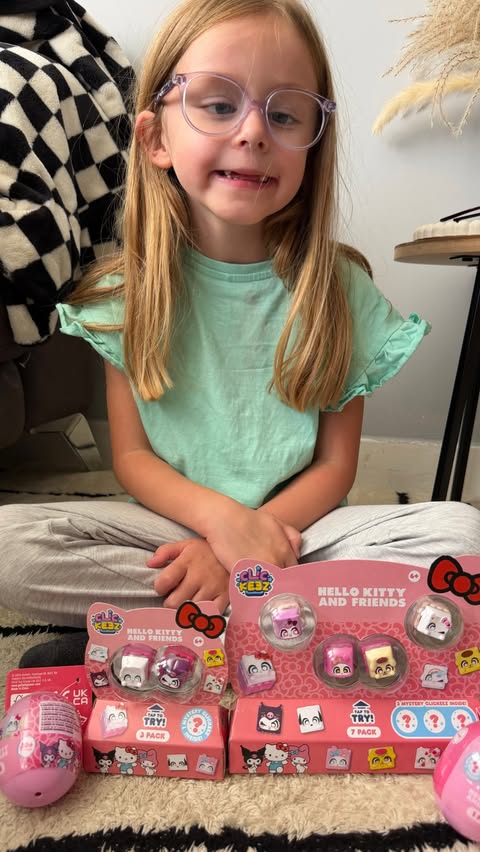 Instagram post by @raisinglottieandindie for Smyths Toys Superstores. Caption reads: 🩷 hello kitty x @officialclickeez 🩷 Our new....