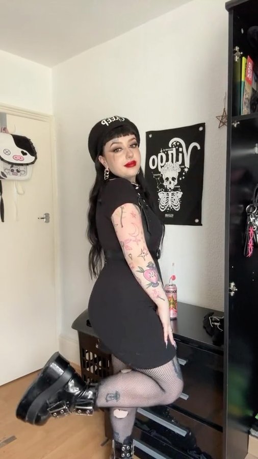 Instagram post by @opheliaxhiraeth for Demonia Shoes. Caption reads: GRWM work outfit edition! 
No you can’t see the....