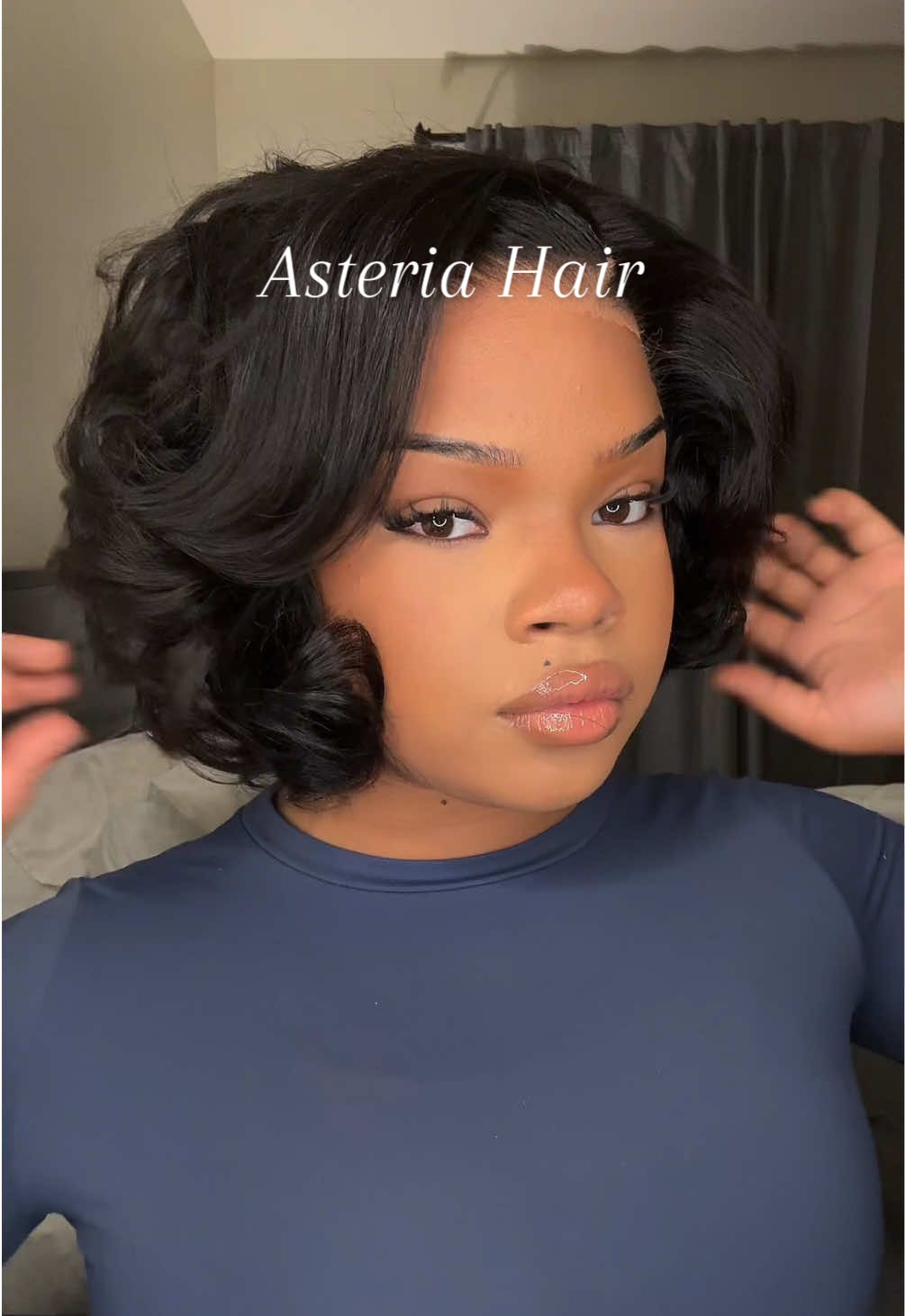 TikTok post by @aliyahmuse for Asteria Hair. Caption reads: Feeling this look! Hair from @Asteria Hair #bob....