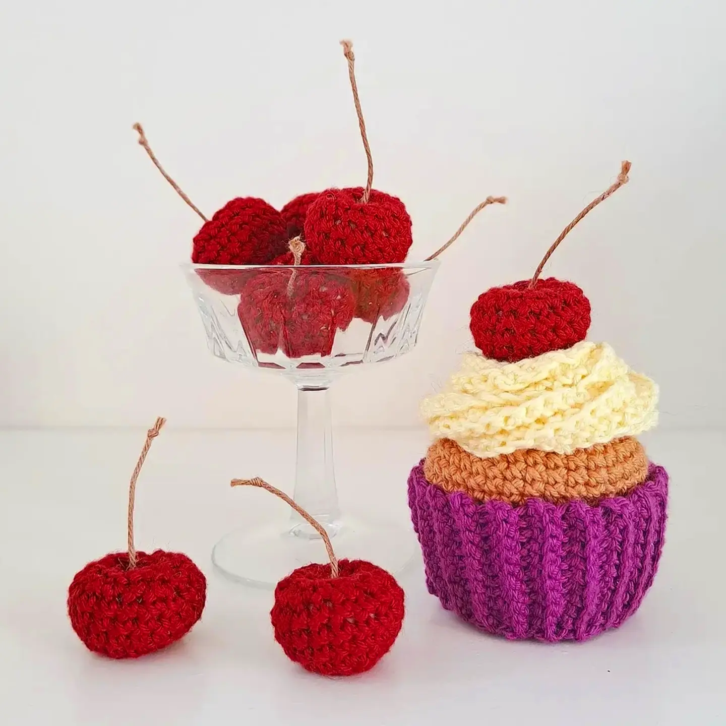 Instagram post by @virkase for Hobbii. Caption reads: My cupcake🧁 pattern @hobbii_yarn in many....