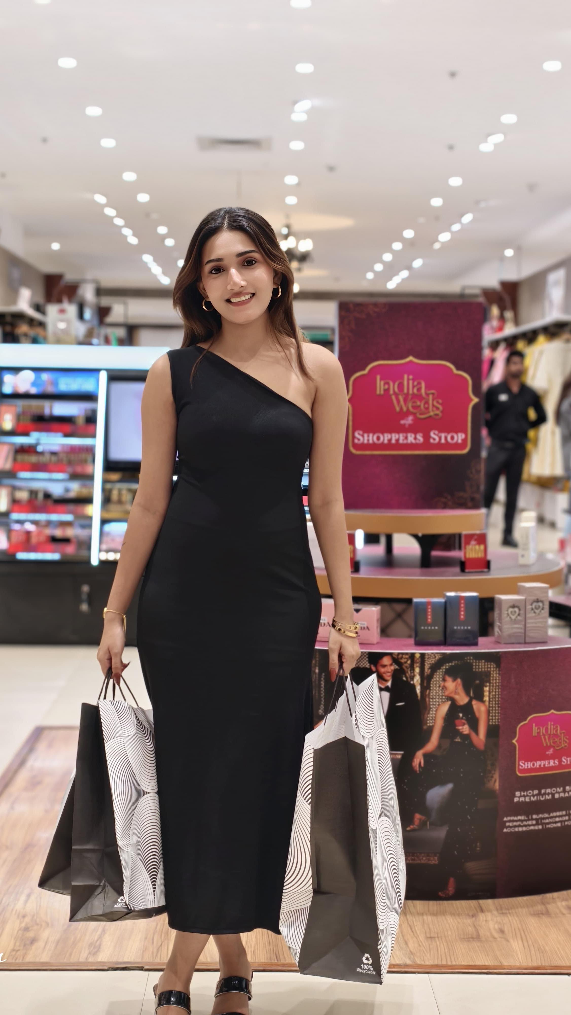 Instagram post by @janki_patelll_official for Shoppers Stop. Caption reads: Festive magic meets winter wonderland at Shoppers....