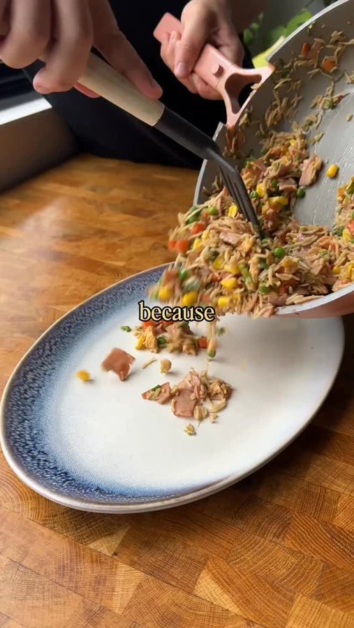 Instagram post by @creamy_confusion for SunRice. Caption reads: 🍚YIAYIA’s FRIED RICE…

My Yiayia, despite being....