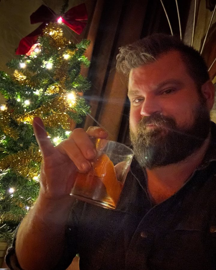 Instagram post by @jaredraytx for Maker’s Mark. Caption reads: Merry Christmas!! 🎄🥰 Celebrate with @makersmark....